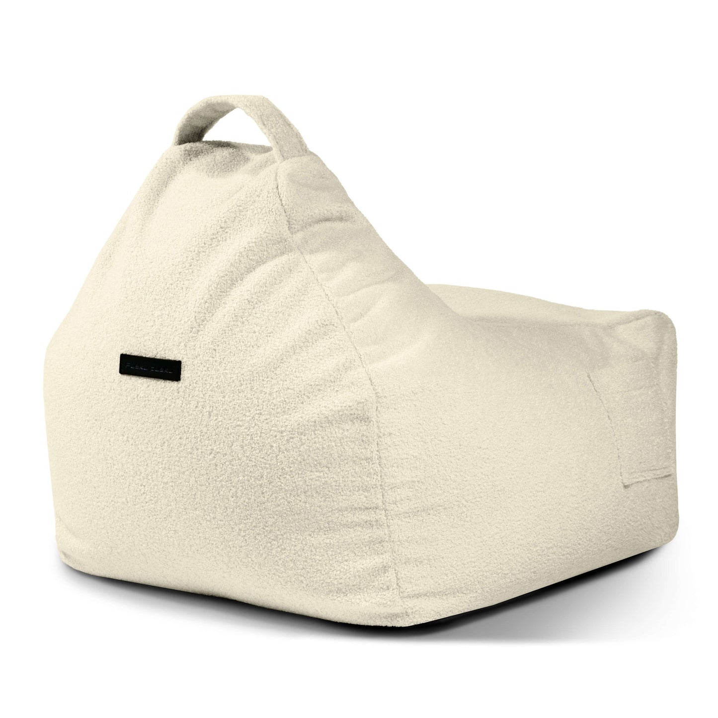 El Bean bag Game Teddy es un sillón ergonómico de color crema con textura, respaldo triangular, asa superior y una pequeña etiqueta lateral negra.