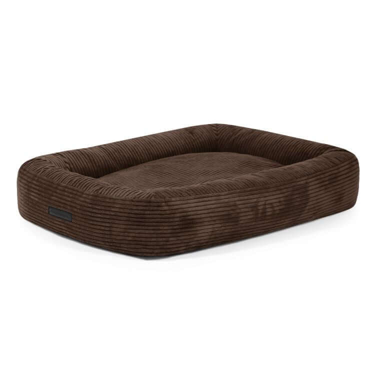 Cama para perro de terciopelo acanalado DOG BED 100 WAVES (100×70×20 cm), con bordes elevados y superficie plana para dormir, mostrada sobre fondo blanco.