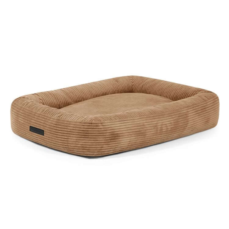 Cama para perro de terciopelo acanalado DOG BED 100 WAVES (100×70×20 cm), rectangular con bordes elevados y superficie plana para dormir, sobre fondo blanco.
