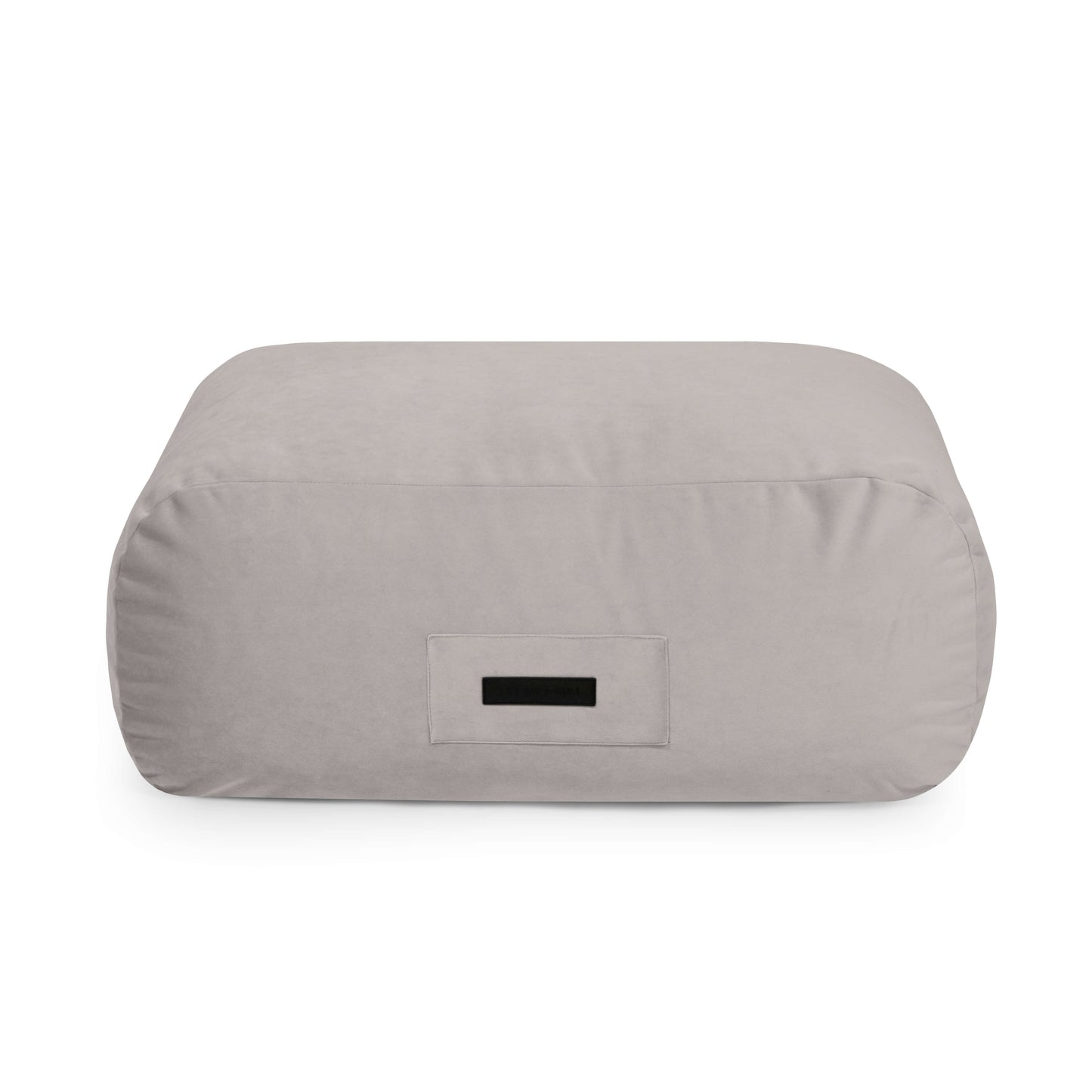 ChatGPT Plus Puff de foam tapizado en terciopelo 85×68×40 cm SNUG 83 BARCELONA, rectangular con asa frontal de tela, ideal para salón o dormitorio; brinda asiento ergonómico para mayor comodidad.