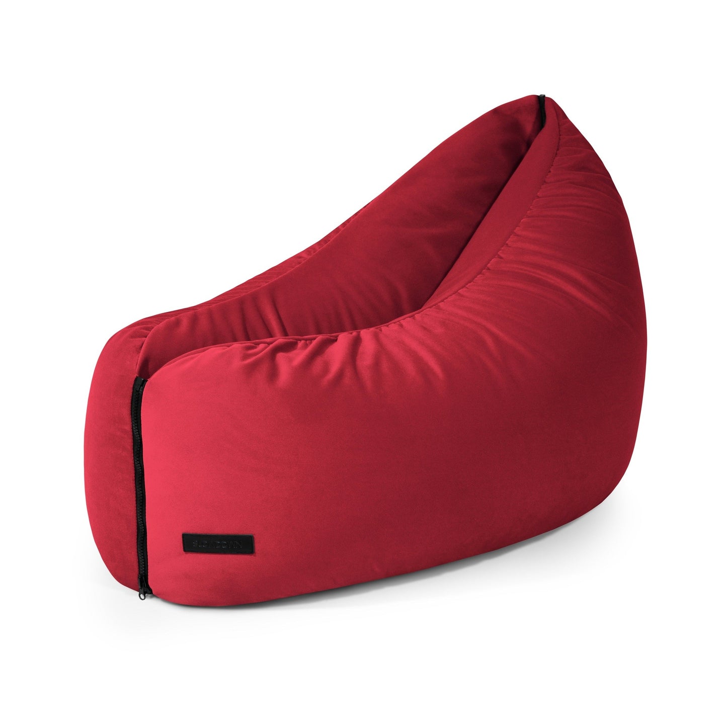 Bean bag puff infantil de terciopelo 90×70×60 cm de CLIP CLAP 90 BARCELONA en forma de lágrima roja, con cremallera y etiqueta negra, acabado en terciopelo, diseño ergonómico, perfecto para un dormitorio o cuarto de juegos moderno, sobre fondo blanco.