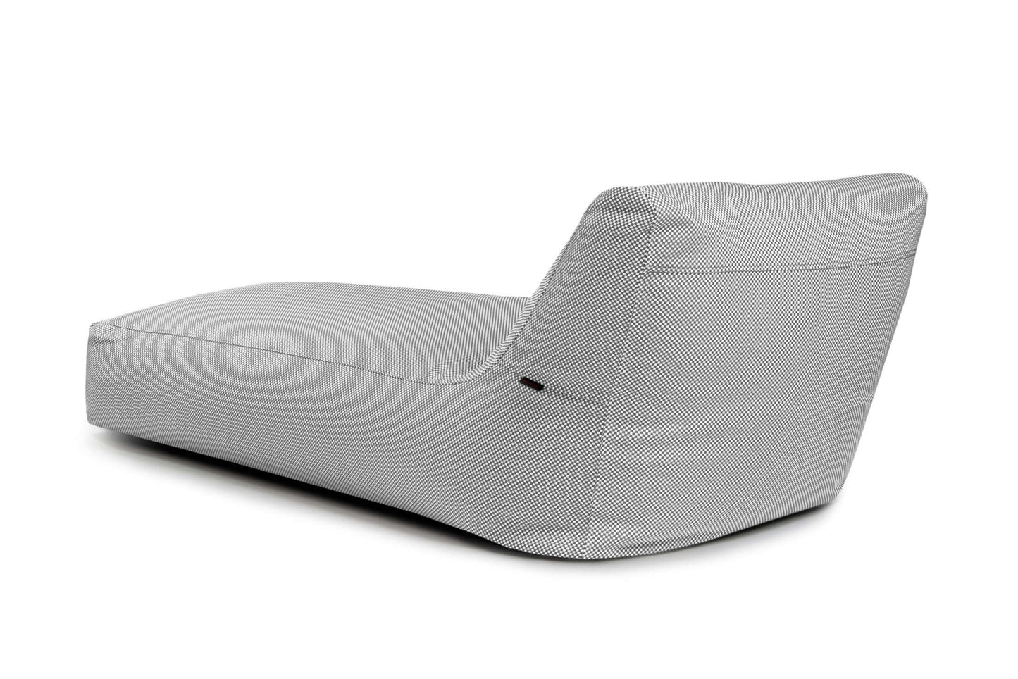 La tumbona Bean bag 90 Canaria - uso exteriores es una moderna tumbona gris sin brazos, con tejido texturizado y perfil bajo, que se asemeja a una elegante tumbona bean bag, mostrada de espaldas y ligeramente de lado.
