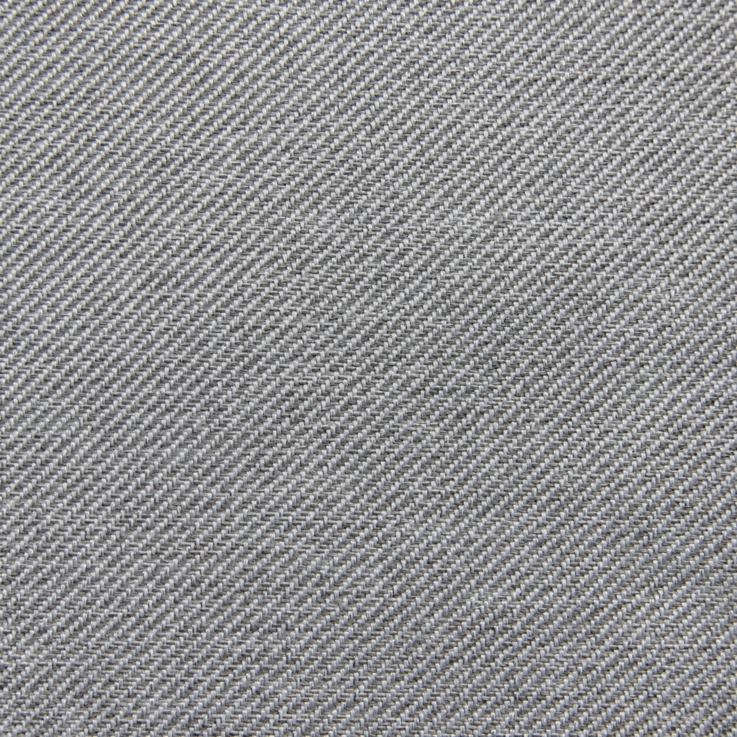 Detalle del tejido vaquero azul con un patrón de tejido de sarga diagonal y textura visible, perfecto para hacer el Bean Bag Game Riviera - uso exterior u otro mobiliario infantil duradero para exteriores.