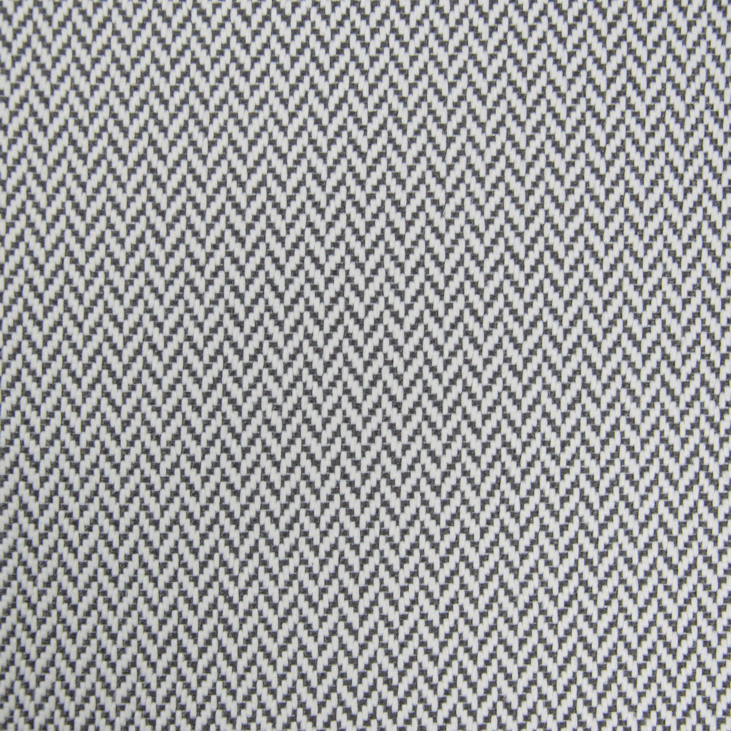 Detalle de un tejido chevron en blanco y negro, ideal para el Bean bag Lounge Zip Canaria, perfecto para exteriores y diseños modulares con asiento ergonómico.