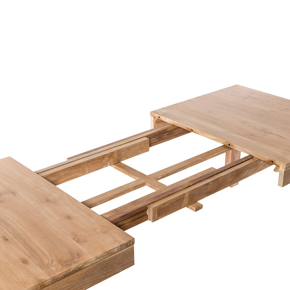 La mesa de comedor extensible Nabila está elaborada con madera de teca de primera calidad, presenta un mecanismo deslizante visible y secciones desmontables para realzar su diseño elegante al permitir un alargamiento sin esfuerzo.