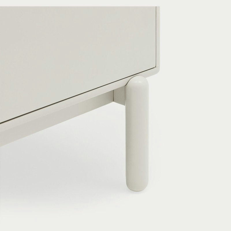 Primer plano de la pata del Mueble TV Corvo 2P2C, que muestra un diseño cilíndrico moderno, sobre un fondo claro: una encarnación del diseño contemporáneo.