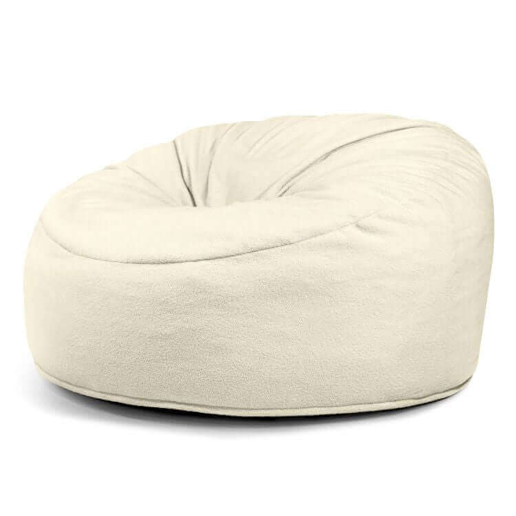 La Foam Bean Bag Om 135 Teddy - uso exteriores, una gran silla redonda con funda blanda, se muestra sobre un fondo blanco liso.