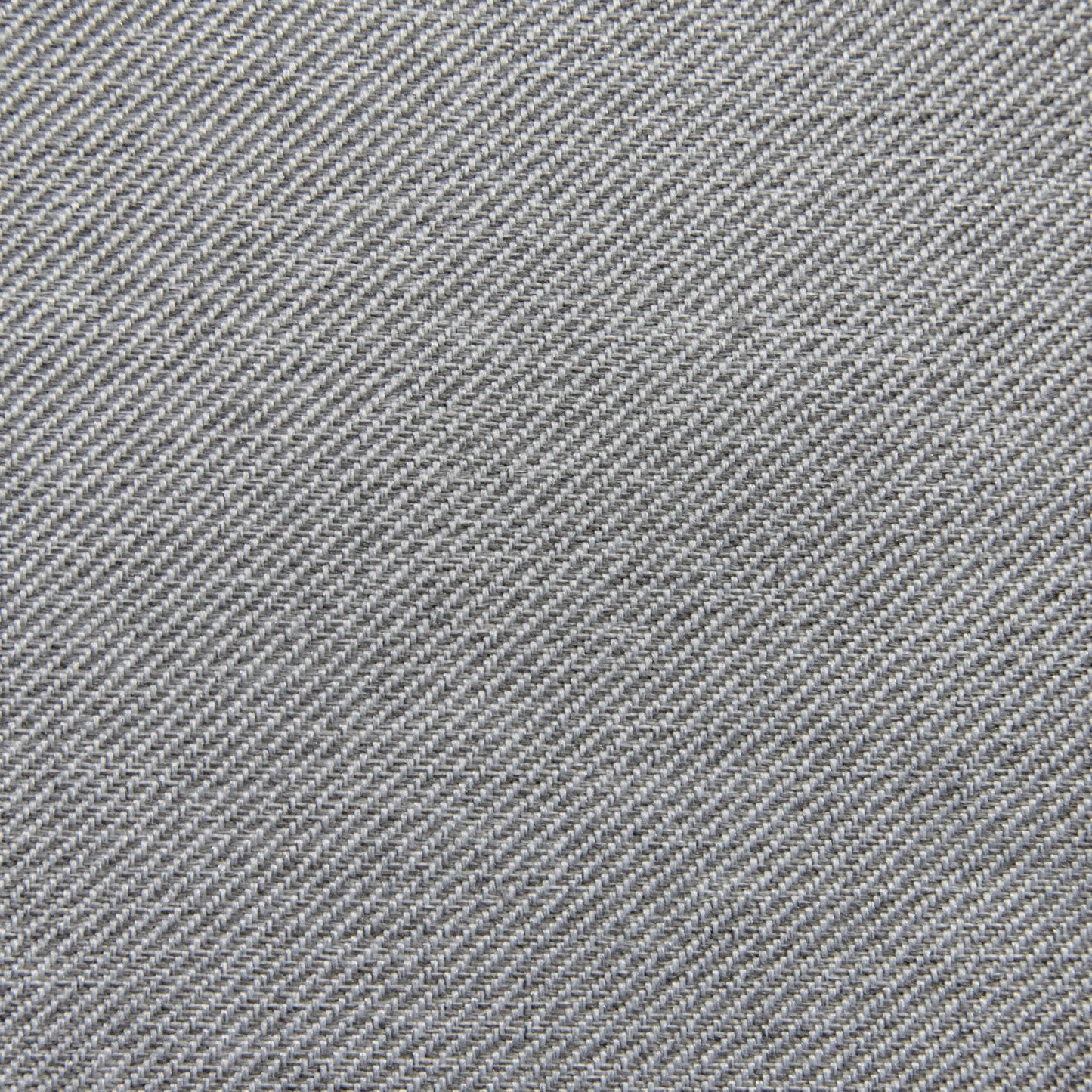 Primer plano de tela vaquera azul con trama de sarga diagonal y textura fina, perfecta para confeccionar el Foam Bean Bag Om 85 Riviera - uso exteriores.