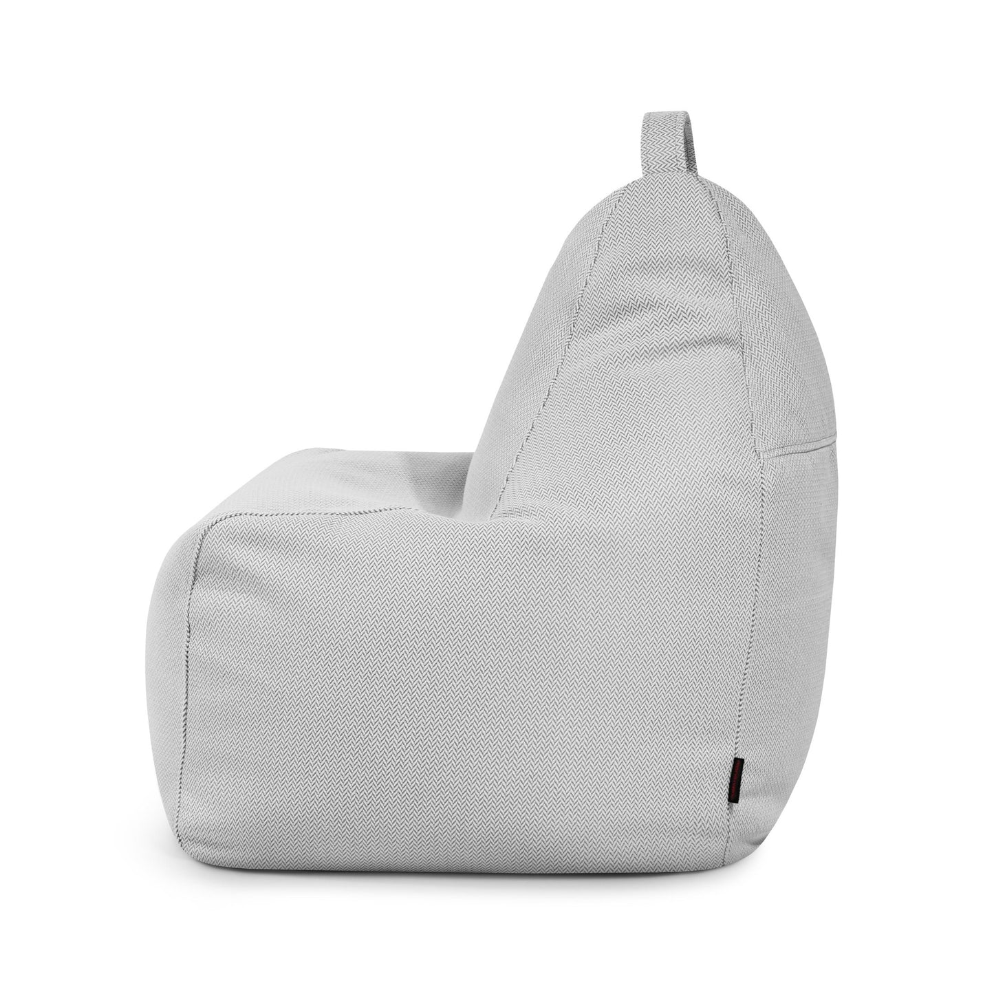 Vista lateral del Bean bag Play Canaria gris claro texturizado - uso exteriores con asa en el respaldo; un asiento ergonómico ideal como puff tanto para niños como para adultos.