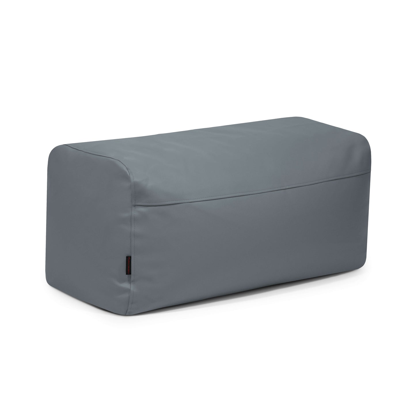 El Pouf Plus 100 Outside es un puf rectangular de tela gris con bordes redondeados, ideal como puf ergonómico para muebles modernos de exterior.