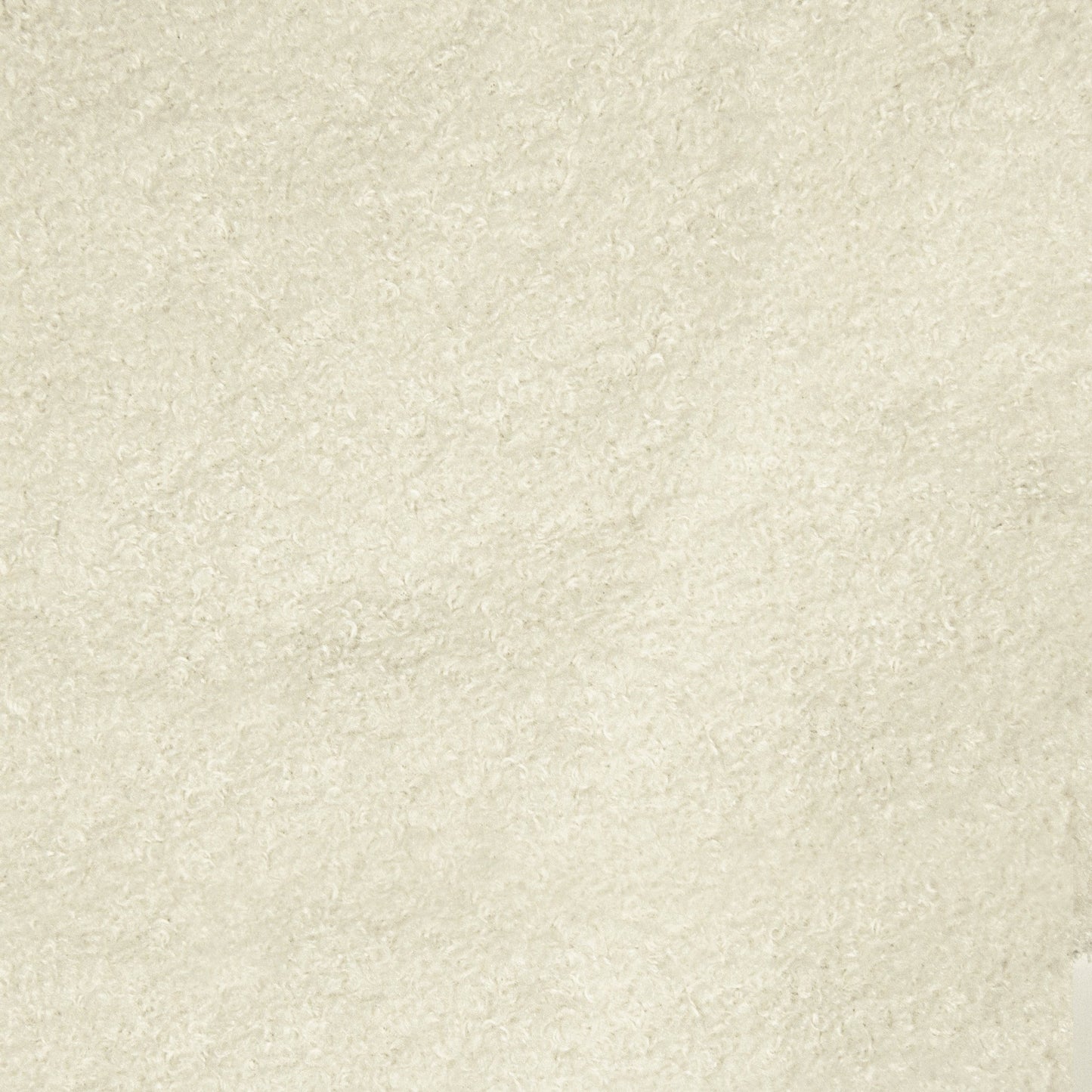 Un primer plano de la superficie de tejido borreguito beige claro del puff Bean bag juvenil RAZZ TEDDY (110×130×90 cm) muestra bucles y fibras texturizados, ideales para dormitorios modernos y asientos acogedores sin estructura interna.