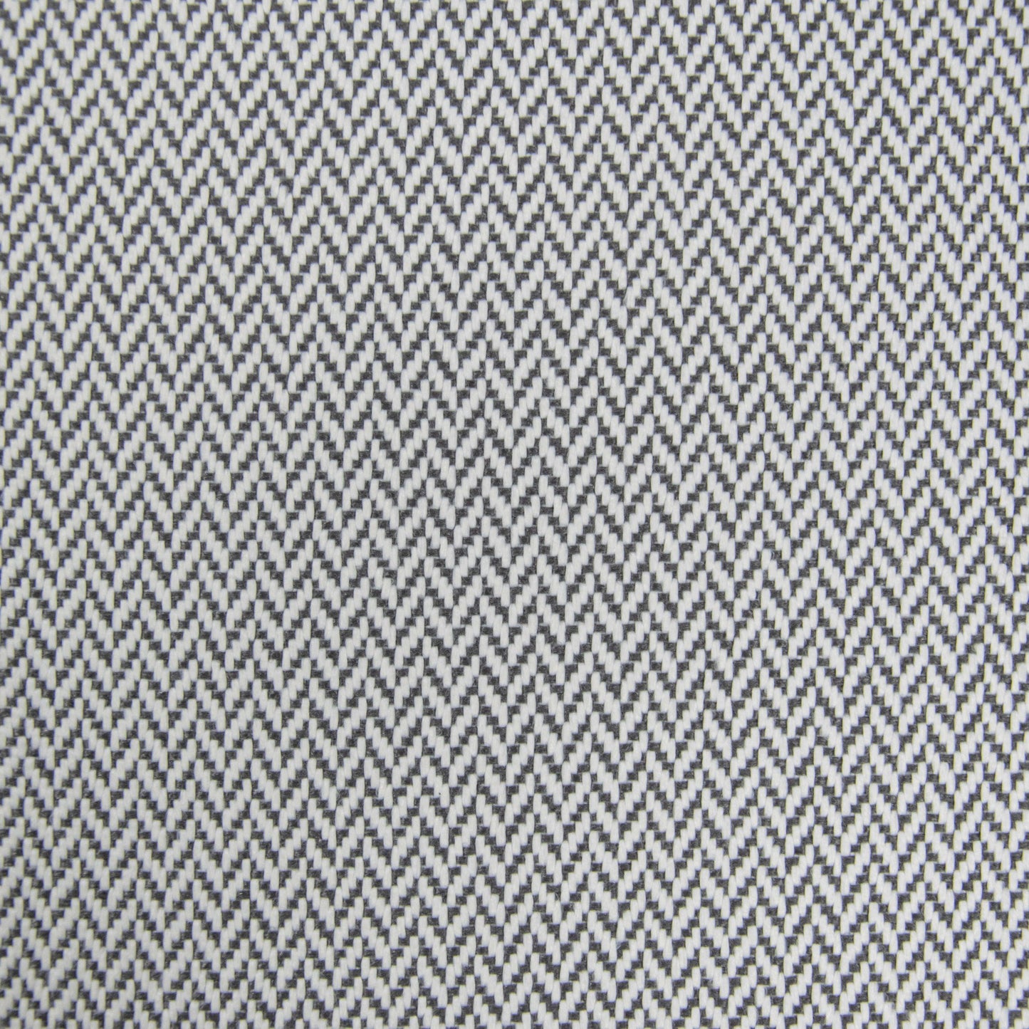 Detalle del tejido de espiga en zigzag blanco y negro del puff Bean bag infantil RAZZY CANARIA, perfecto para una habitación pequeña o un acogedor asiento infantil. La tela repelente al agua lo hace ideal para exteriores (75×110×65 cm, moderno).