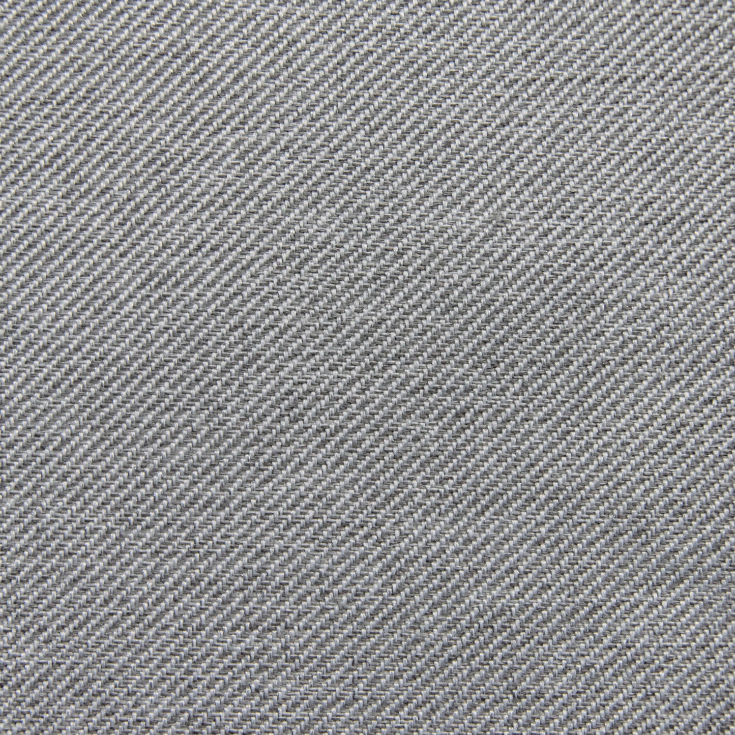 Detalle del tejido vaquero azul con trama de sarga diagonal, ideal para confeccionar el Bean Bag Roll 135 Riviera - uso exteriores o realzar cualquier puff moderno o asiento informal.