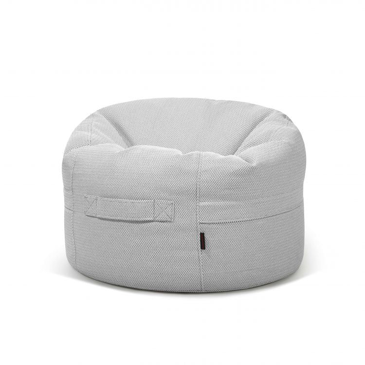 El Bean Bag Roll 80 Canaria - uso exteriores es un sillón bean bag redondo de color gris claro, con la parte superior ligeramente hendida, asa lateral y un sutil dibujo texturizado, que se muestra sobre un fondo blanco.