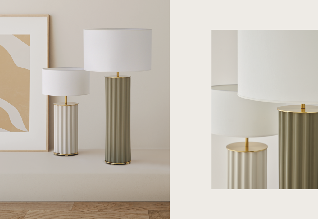 Dos modernas Lámparas de mesa en Cerámica y Metal Sonica, una blanca y otra verde oliva con bases cilíndricas estriadas, se sitúan junto a una obra de arte abstracta enmarcada en una ligera repisa, añadiendo un toque elegante y decorativo al espacio.