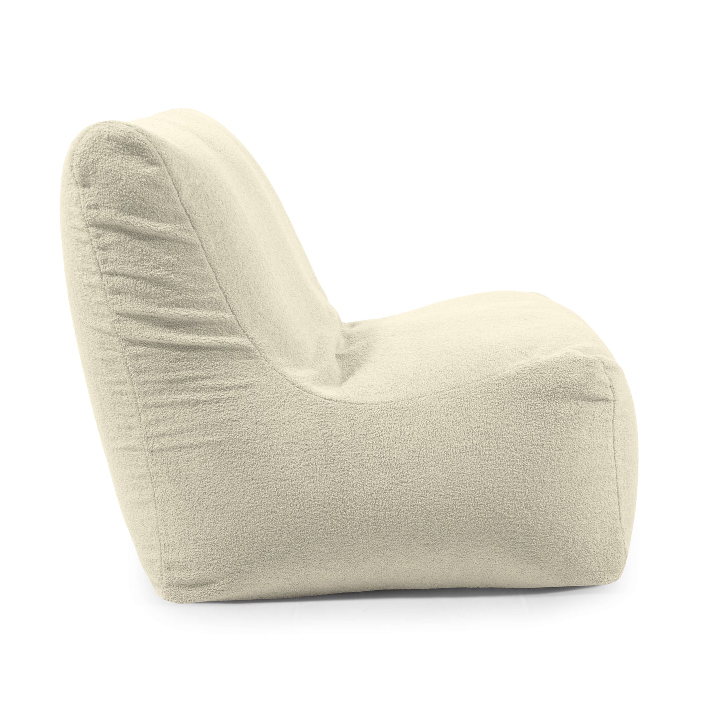 Vista lateral del Bean Bag Seat 100 Teddy, un moderno sillón sin brazos de color beige con tejido de felpa texturizado y asiento curvado ergonómico, que combina la comodidad de un sillón puff con un diseño contemporáneo.