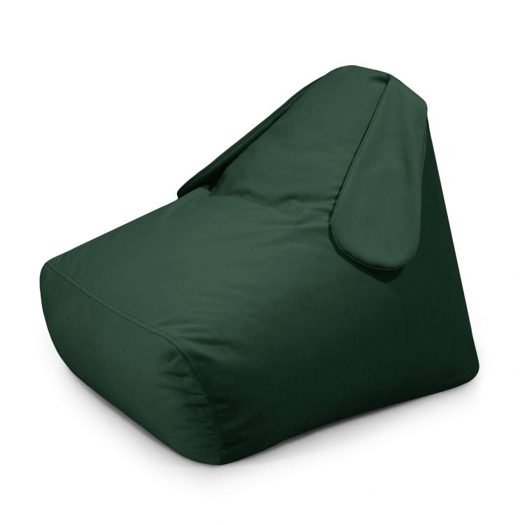 El SNUG 80 BUNNY BARCELONA es un puff infantil verde oscuro de terciopelo y espuma (80×90×70 cm) con respaldo triangular y solapa lateral, perfecto para dormitorios o salas de juegos, que se muestra sobre un fondo blanco liso.