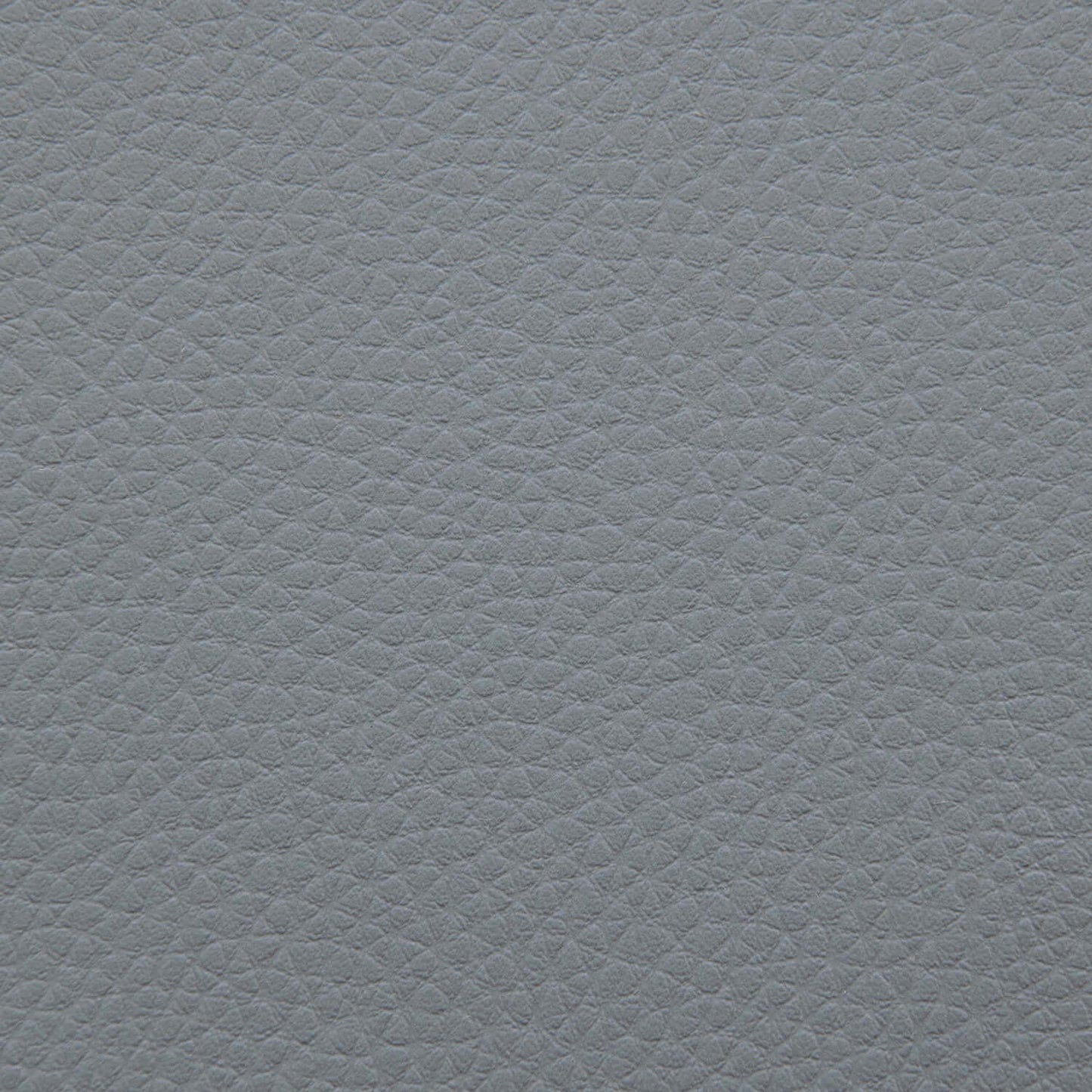 Detalle del cuero gris texturizado con un fino dibujo de guijarros, perfecto para tapizar el Bean bag Sunbed 90 Outside - uso exteriores para un aspecto exterior elegante y duradero.