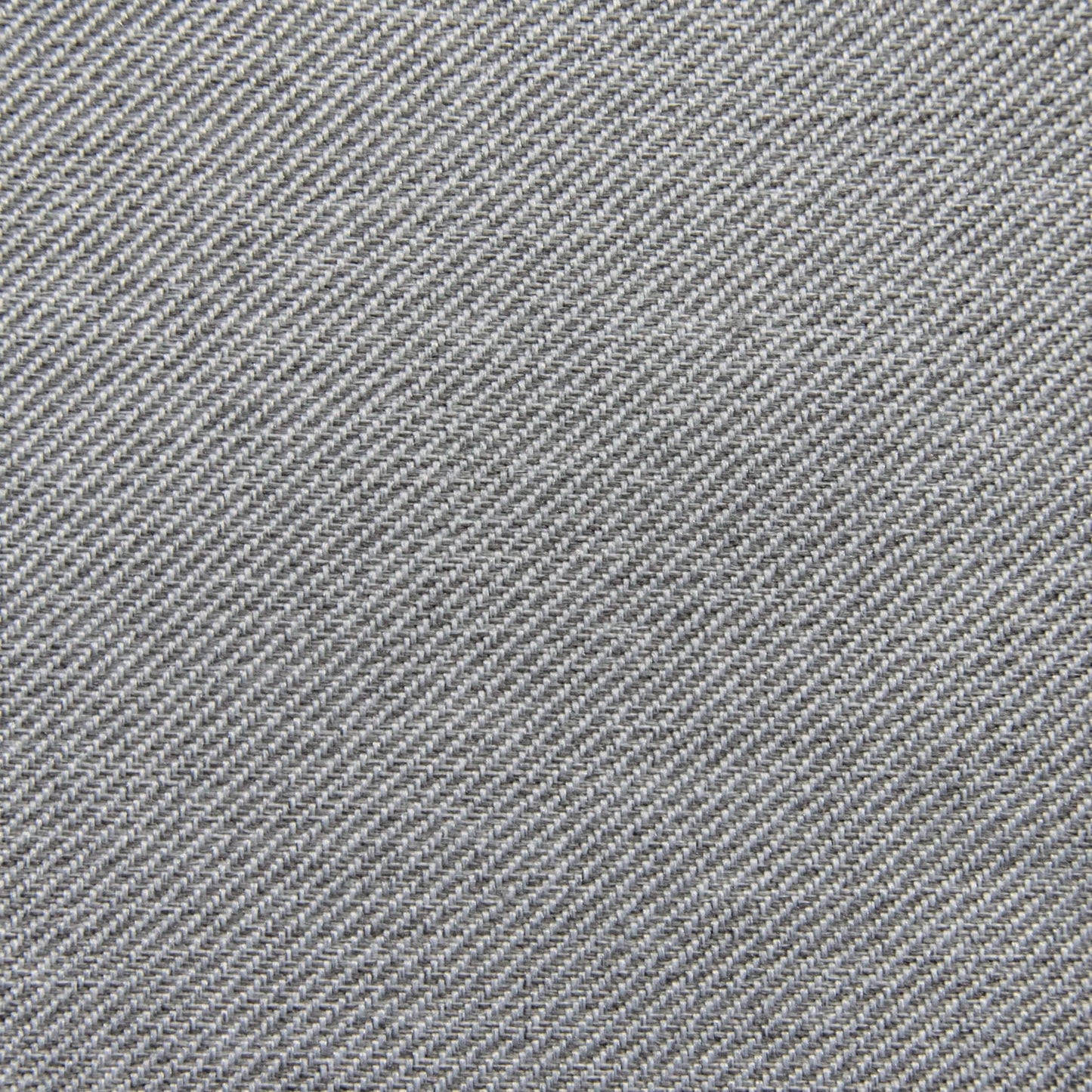 Detalle del tejido vaquero azul con trama de sarga diagonal, similar a la textura resistente del Bean bag Sunbed 90 Riviera - uso exteriores, diseñado para la comodidad en exteriores.