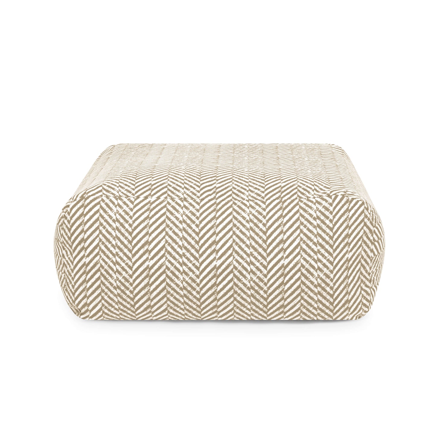 El TUBO 80 ZARZUELA es una moderna otomana cuadrada (85×85×38 cm) con tejido estampado lavable y resistente al sol -perfecto para uso en exteriores- que se presenta sobre un fondo blanco liso.