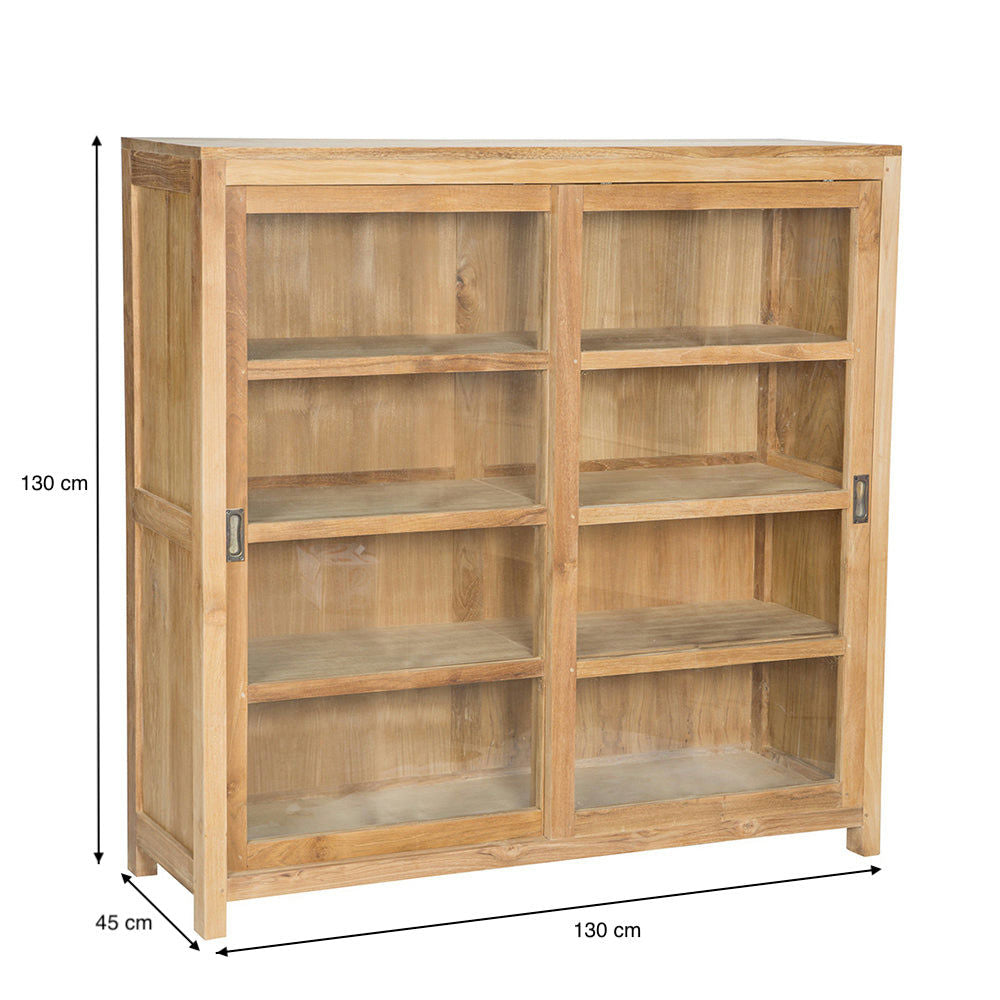 La Vitrina en Madera de Teca y Cristal Consul cuenta con un diseño minimalista con puertas de vidrio y seis estantes espaciosos. Fabricada en madera de teca de primera calidad, mide 130 cm de alto, 130 cm de ancho y 45 cm de profundidad.