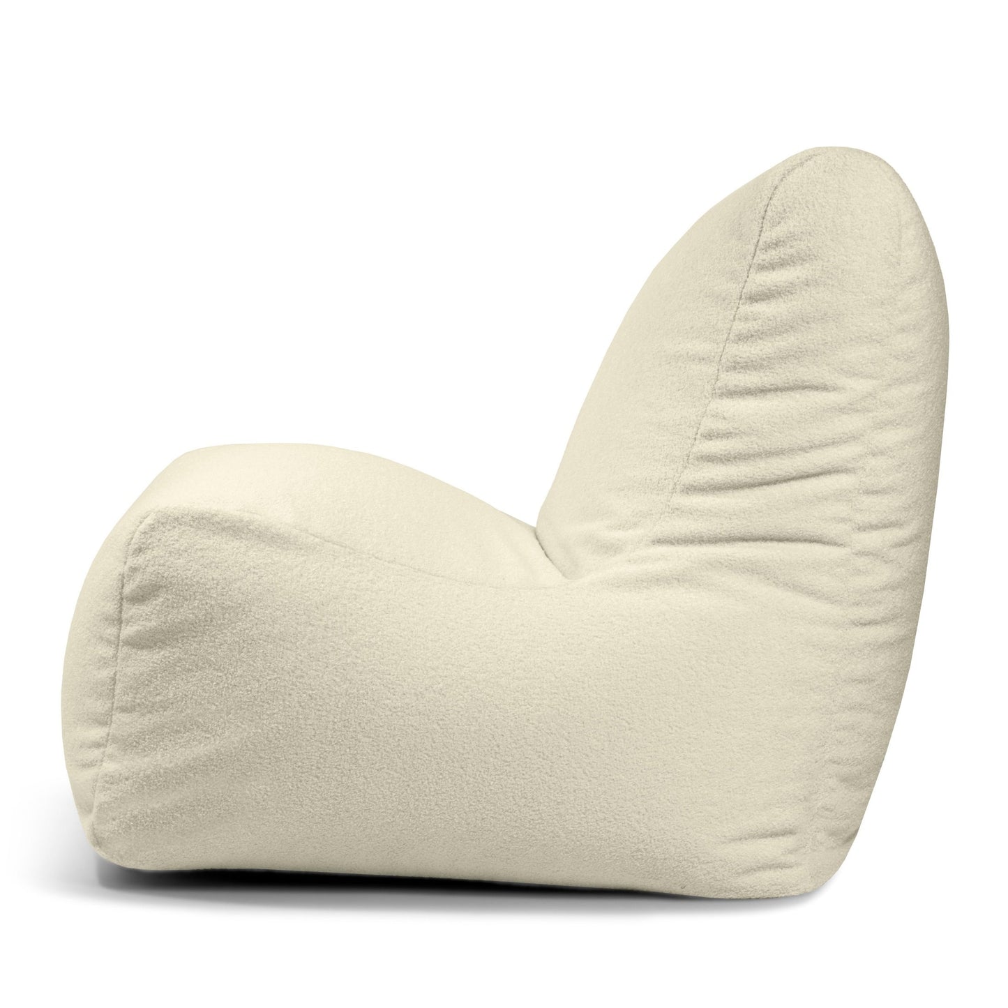 Vista lateral del Bean bag Seat Teddy, un moderno sillón sin brazos de diseño afelpado y curvado y suave tapizado de tela color crema, que recuerda a un sillón tipo puff para una experiencia de asiento acogedora y ergonómica.
