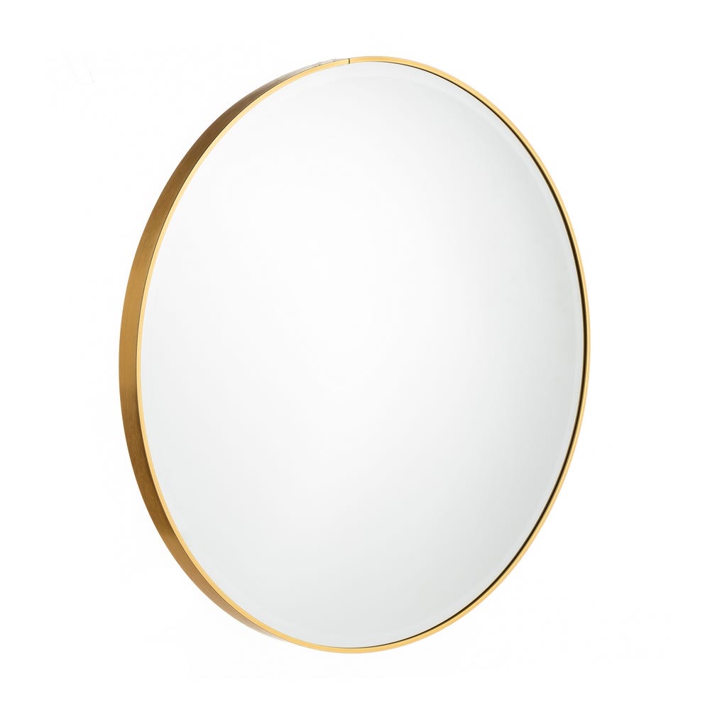 El Espejo de Aluminio en Oro Circular Fordeco es un elegante espejo con un elegante marco con acabado dorado, sobre un fondo blanco liso.