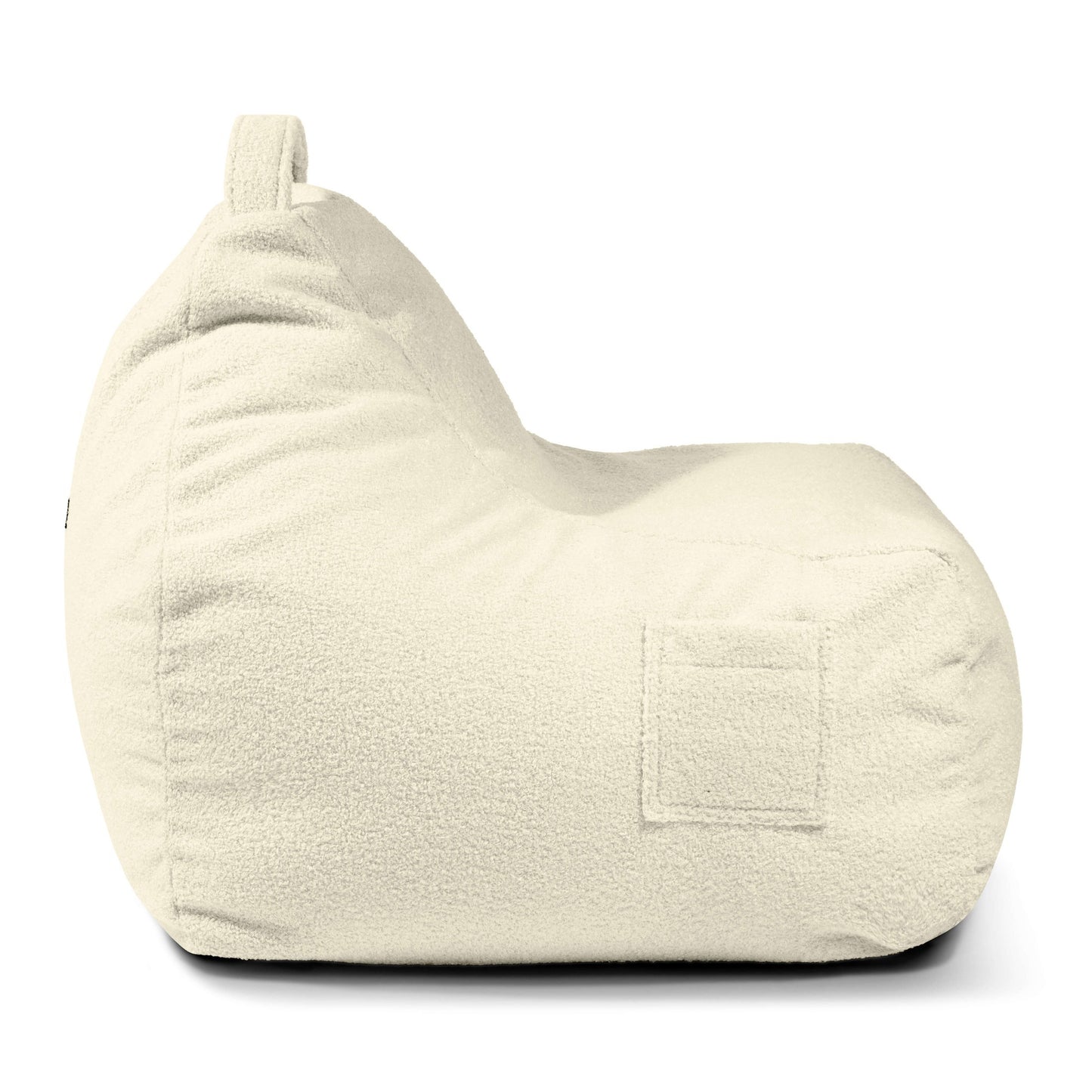 El Bean bag Game Teddy en color crema con un diseño de puff texturizado y ergonómico se muestra de lado sobre un fondo blanco, con un asa superior y un detalle de cuadrado cosido en el lateral.
