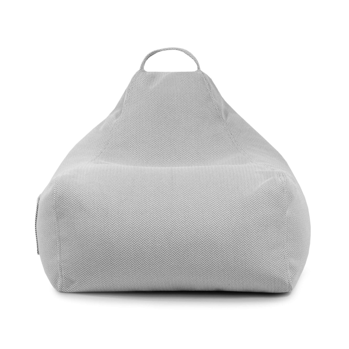 El Bean bag Game Canaria - uso exteriores es un puf infantil de color gris claro con una superficie texturizada, un asa superior para facilitar su transporte y un diseño ergonómico para mayor comodidad, mostrado de frente.