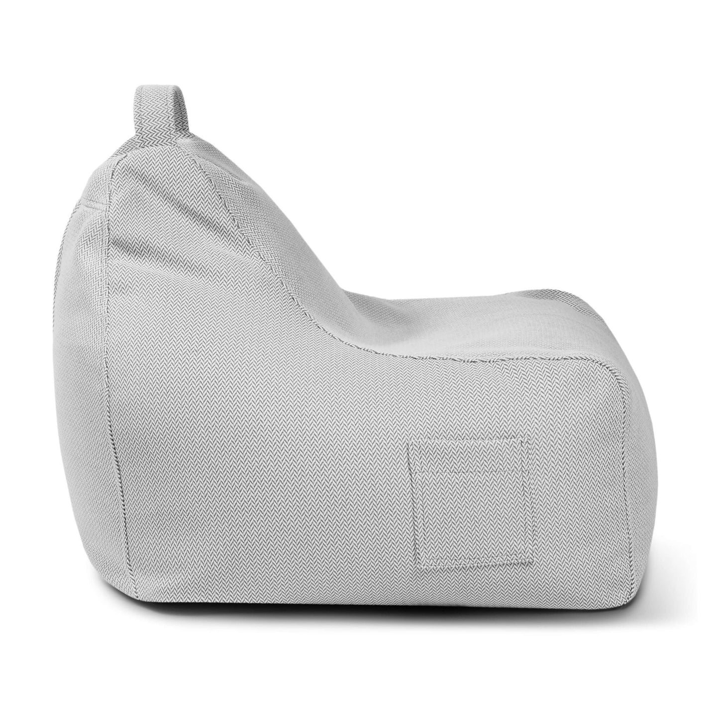 Bean bag Game Canaria gris claro para uso exterior, con asa superior, mostrado de lado sobre fondo blanco.