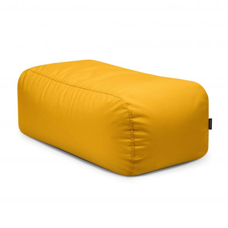 El TUBE 100 COLORIN es un moderno puf otomano rectangular (100×57×38 cm) con un tejido estampado duradero y resistente al sol para uso en interiores y exteriores, sobre fondo blanco.