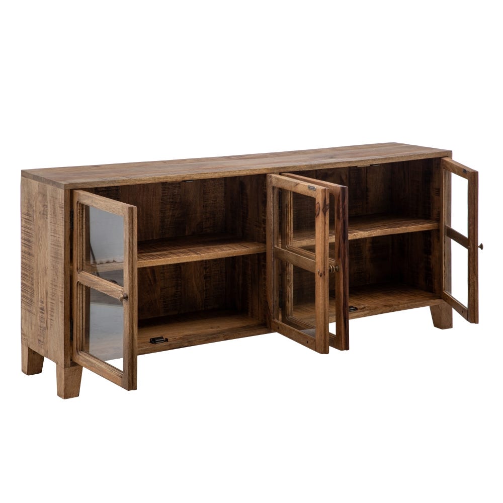 El Aparador bajo en Madera de Mango y Cristal Indy, fabricado en madera de mango, presenta puertas abiertas con paneles de vidrio y dos estantes interiores. Ideal para espacios de estilo rústico o industrial, combina encanto estético con practicidad.