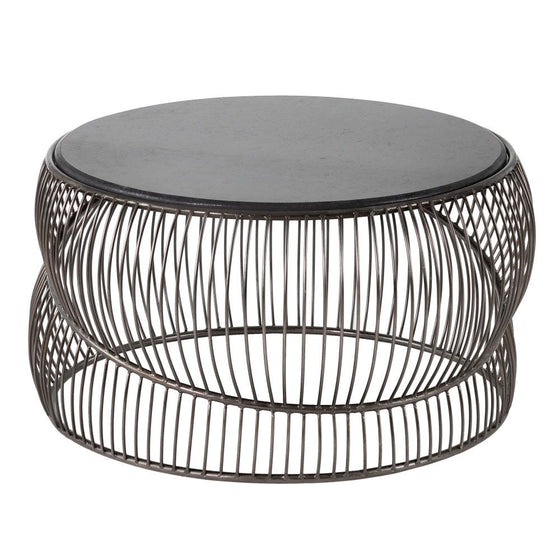 La mesa de centro en metal y mármol plata Novax presenta un diseño elegante con un marco de metal redondo y una cubierta negra sólida, perfecta para agregar estilo y funcionalidad a cualquier sala de estar.