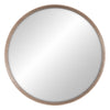 El Espejo Natural en DM Redondo Vinilo Nude es un espejo redondo con marco de madera, que refleja perfectamente la luz y encarna un diseño minimalista.