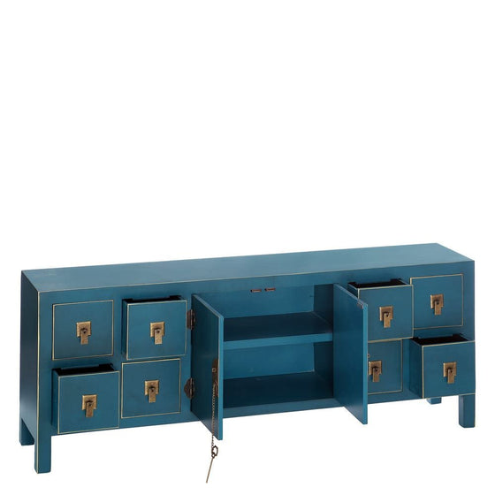 El Aparador de Madera DM Estilo Oriental 'Oriente' es una consola rectangular de color azul con ocho cajones pequeños, un mueble central con puertas abiertas y dos estantes. Su diseño oriental, tiradores de latón y llave pequeña combinan estilo con soluciones de almacenaje.