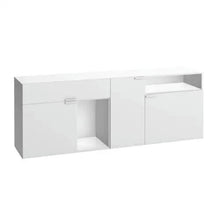  El aparador bajo con cajones Blanco Vooxy es un elegante mueble de almacenaje minimalista de color blanco con tres secciones y tiradores de metal que encarna un diseño contemporáneo. Este aparador de madera ofrece versatilidad funcional para cualquier espacio moderno.