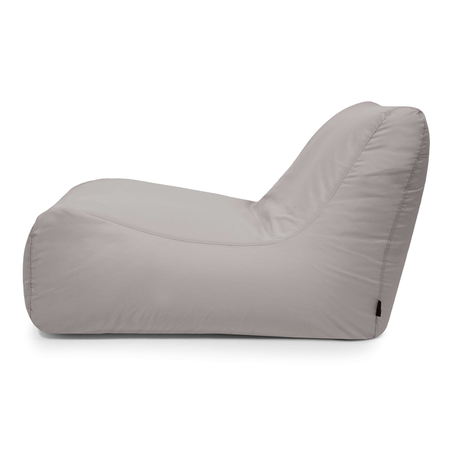 El Bean Bag Lounge 100 Colorin - uso exteriores es un bean bag ergonómico sin brazos de color gris claro con respaldo curvado, mostrado de lado sobre fondo blanco, ideal como mobiliario terraza o para relajarse en espacios modernos.