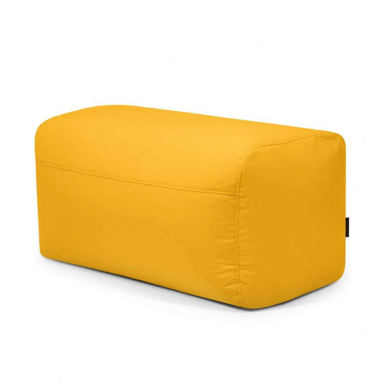 Otomana rectangular Pouf Plus 100 Colorin - uso exteriores de color amarillo, con bordes redondeados y superficie de tela lisa, sobre fondo blanco liso.