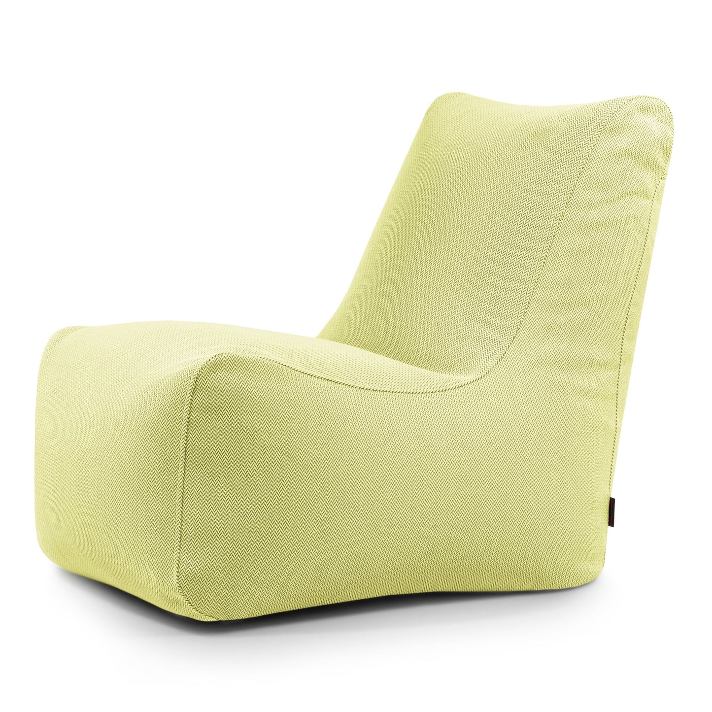 Una moderna tumbona sin brazos de color verde claro, con un suave tejido texturizado y un asiento bajo y ancho, perfecta como el Bean bag Seat Canaria - uso exteriores para un elegante mobiliario de exterior.