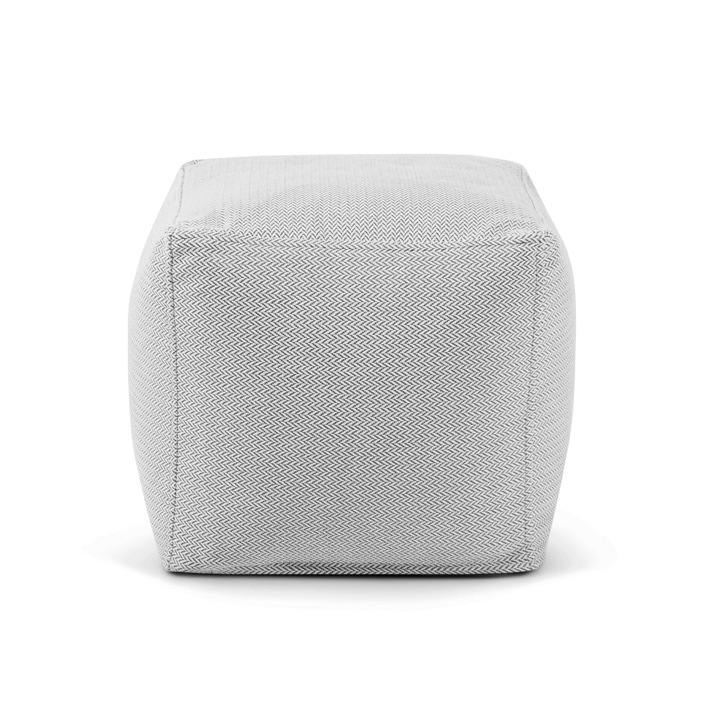 ¡El puf Up! Canaria - uso exterior es una otomana rectangular de tela gris claro con un sutil dibujo de espiga, que ofrece un diseño elegante y un asiento ergonómico para una comodidad versátil en exteriores, mostrada sobre un fondo blanco.