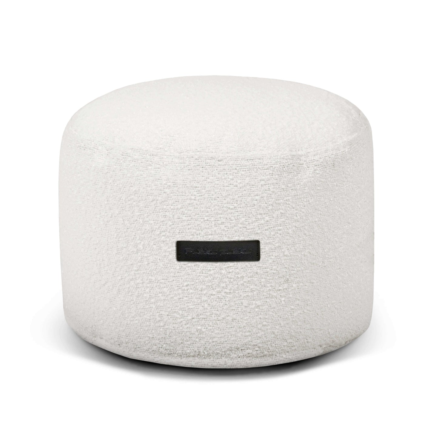 El Puff redondo de tela bouclé 40×40×30 cm MINI MADU es compacto, blanco y texturizado, ideal como asiento cómodo o pouf extra suave para dormitorio o salón moderno.