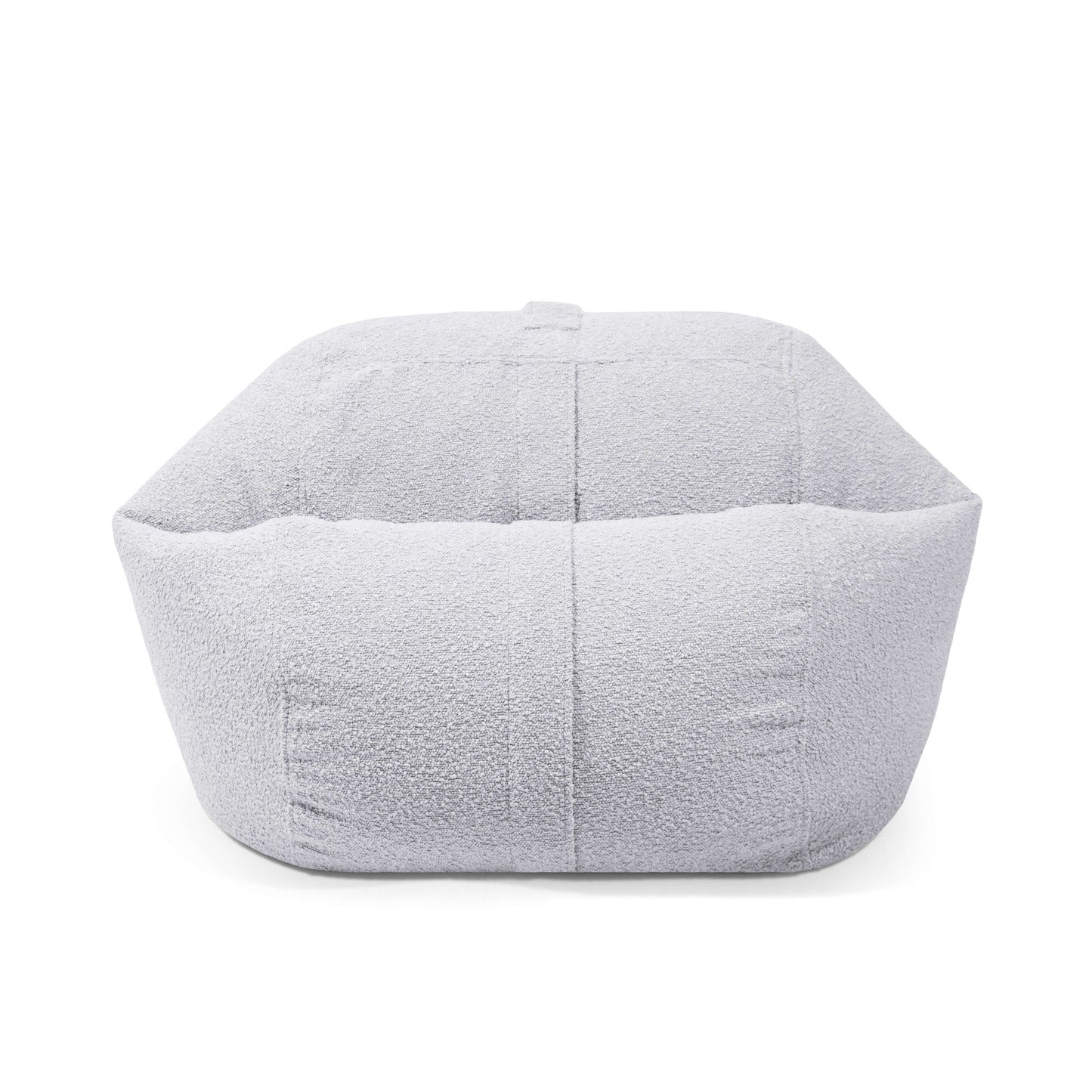 El Puff redondo de bouclé extra suave ROLL 80 MADU (80×80×35 cm), ideal para salón o dormitorio, ofrece un asiento moderno y cómodo para niños, con textura suave y color claro, presentado sobre fondo blanco.