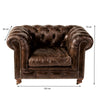 Sillón en Cuero y Madera con Capitone Kensington