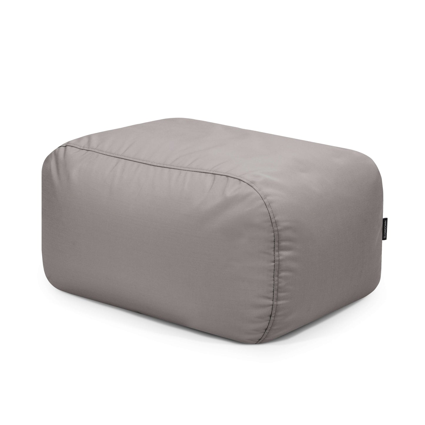 El Bean bag Tube Pouf Colorin es una otomana rectangular de color gris claro con tejido liso y bordes redondeados, resistente al sol, que se muestra sobre un fondo blanco, ideal para uso en exteriores.