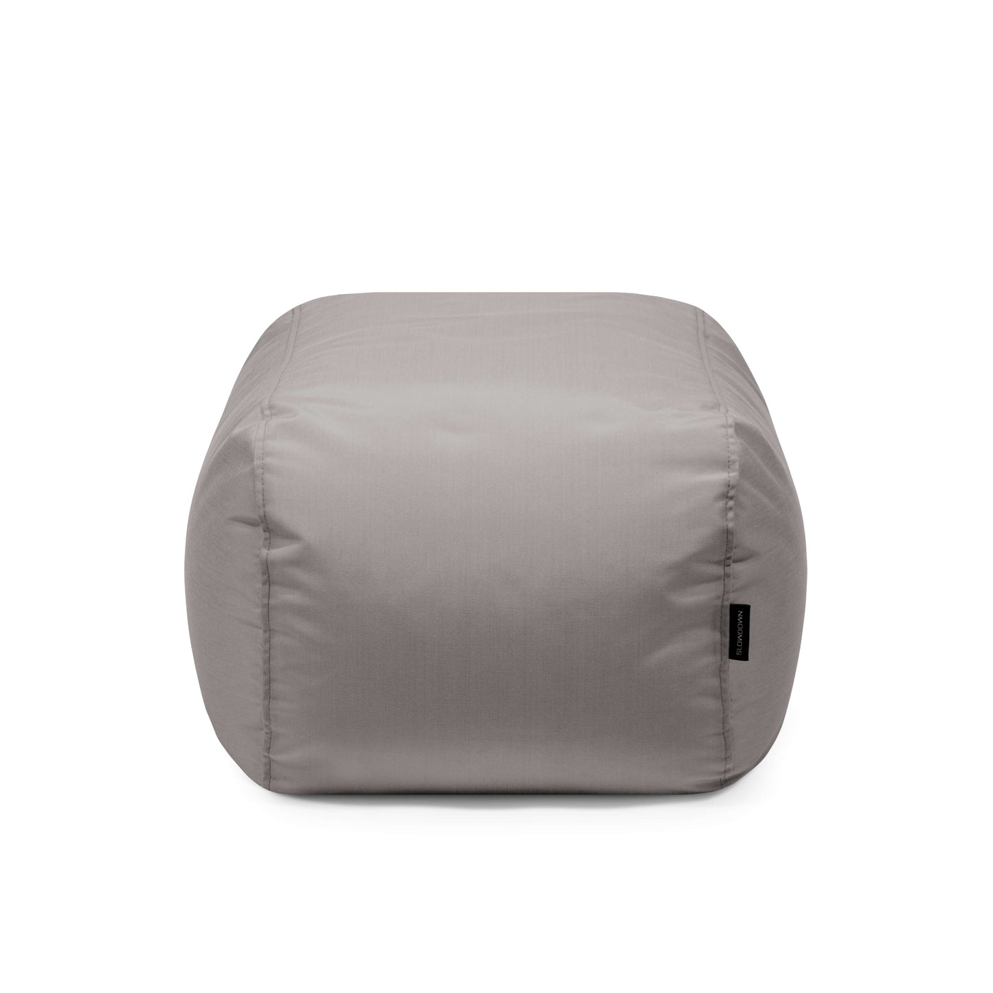 El Bean bag Tube Pouf Colorin - uso exteriores es una otomana rectangular gris con un tejido suave y resistente al sol, que se muestra sobre un fondo blanco liso.
