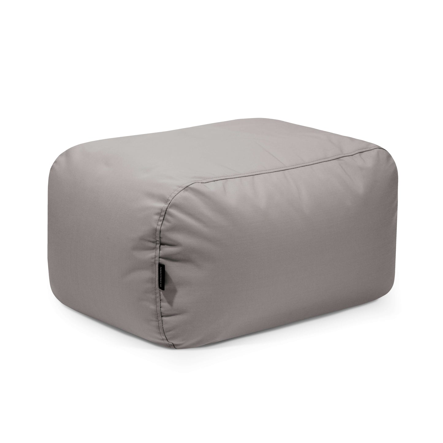 El Bean bag Tube Pouf Colorin - uso exteriores es un puf rectangular de tela gris claro con bordes suaves y redondeados, elegante y resistente al sol, perfecto para un uso versátil en interiores o exteriores.