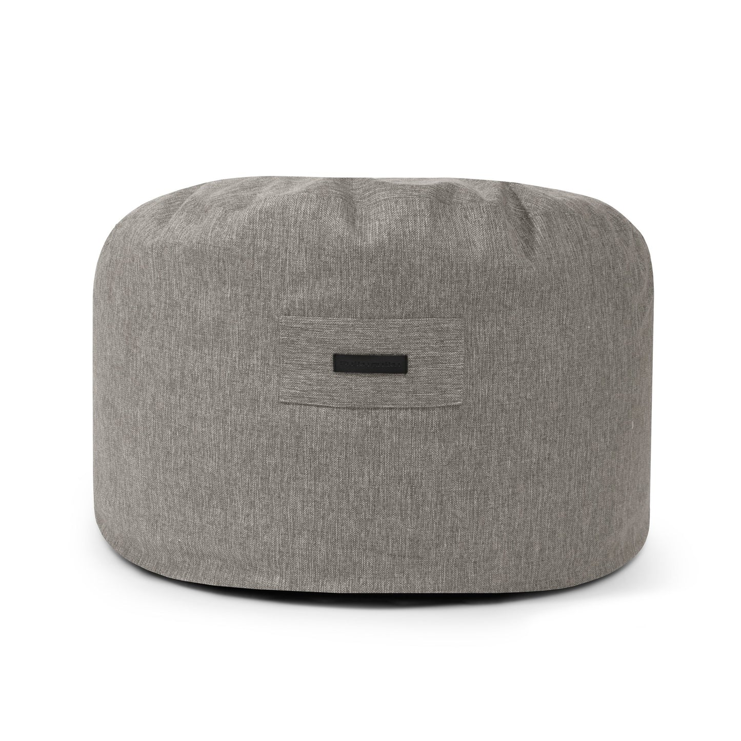 El Puff redondo de foam y chenilla suave 85×85×38 cm de OM 85 HOME es un asiento moderno y ergonómico, ideal para salón o dormitorio, con diseño redondo, textura sutil y asa rectangular en el frente.
