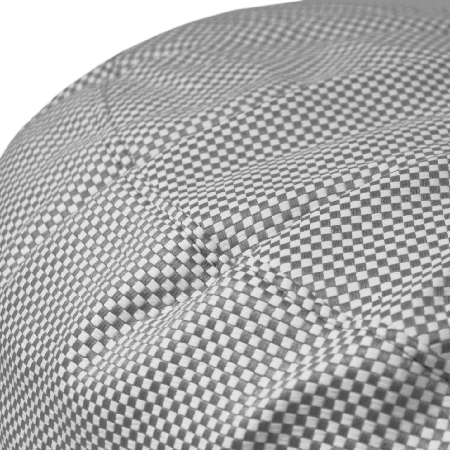 Detalle del tejido del Foam Bean Bag Om 85 Capri, con un pequeño estampado de cuadros y costuras acolchadas visibles, ideal para exteriores.
