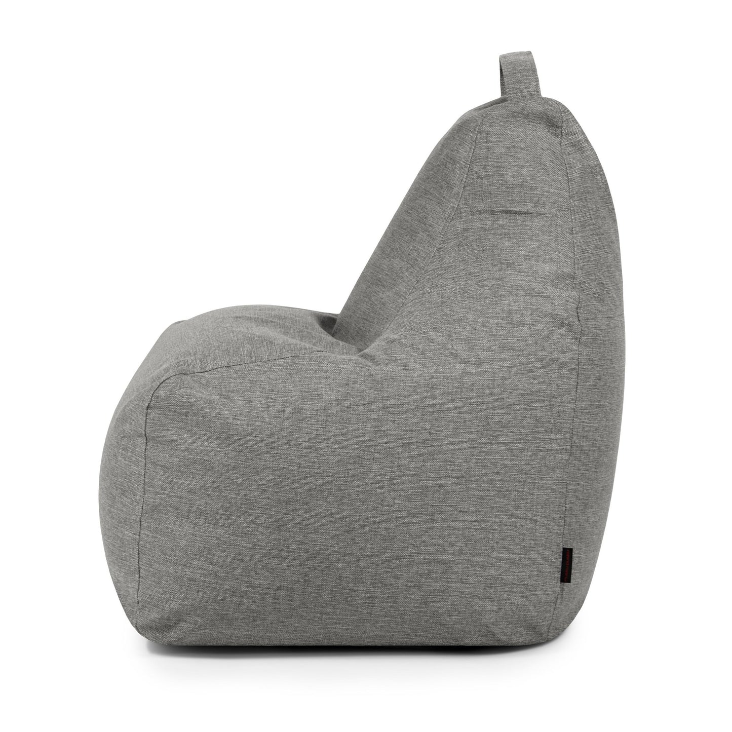 Vista lateral del Bean bag Play Home, con tejido gris, asa superior y funda lavable, sobre un fondo blanco liso.