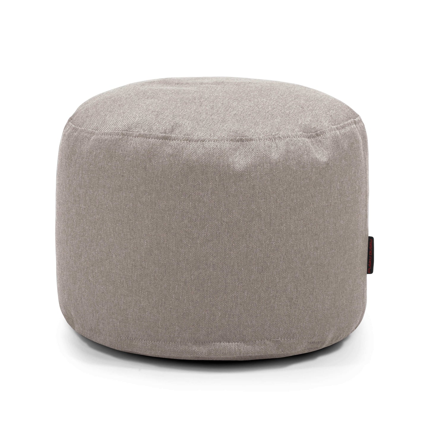 Un Puff redondo de tela suave lavable 40×40×30 cm MINI NORDIC, compacto e ideal como asiento versátil para dormitorios o salones pequeños, se muestra sobre un fondo blanco liso.